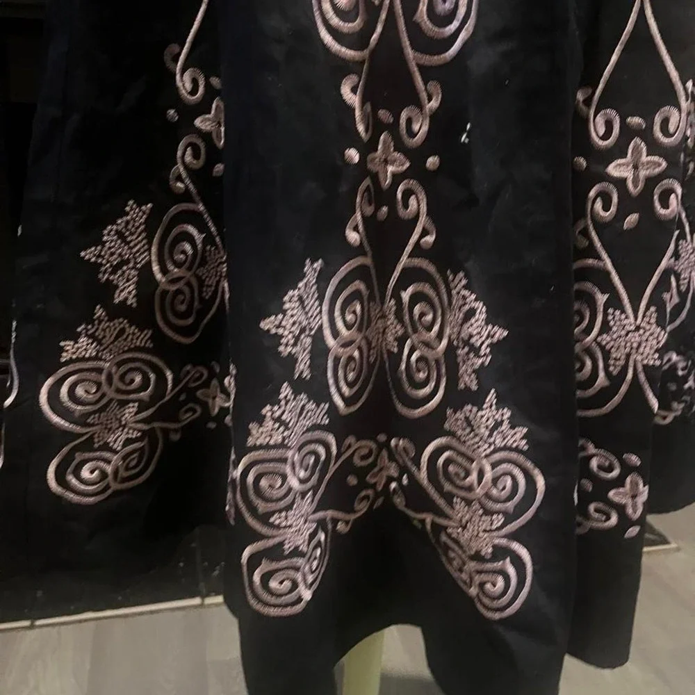 Black maxi skirt with white floral and scrollwork embroidery Coquette